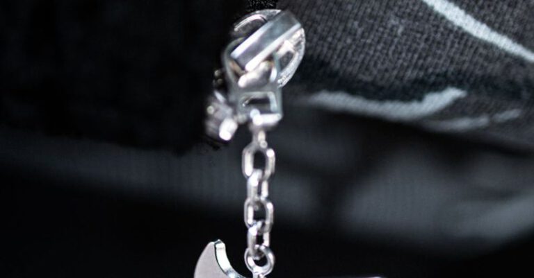 Chain Logo - Close-up of a Brand Logo on a Zipper