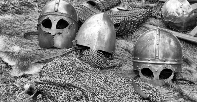 Focus Helmet - Grayscale Photography of Chainmails and Helmets on Ground