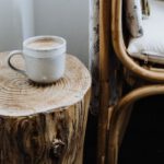 Brew Seat - Chair placed near wooden stump in apartment
