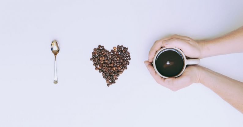 Love Beans - Flat Lay Photography of Mug and Coffee Bean
